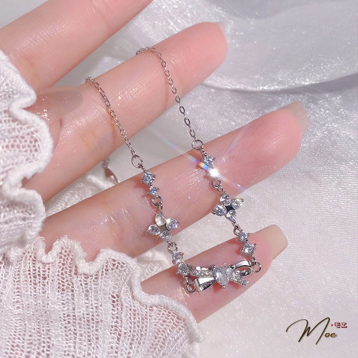 LT651 - Lắc tay Nơ pha lê nút thắt may mắn_thumbnail_1