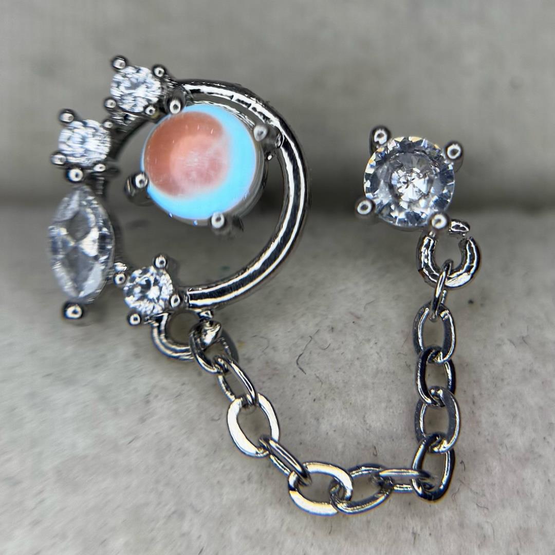 Khuyên kiểu xích mặt đá vàng trắng kim cương._thumbnail_1