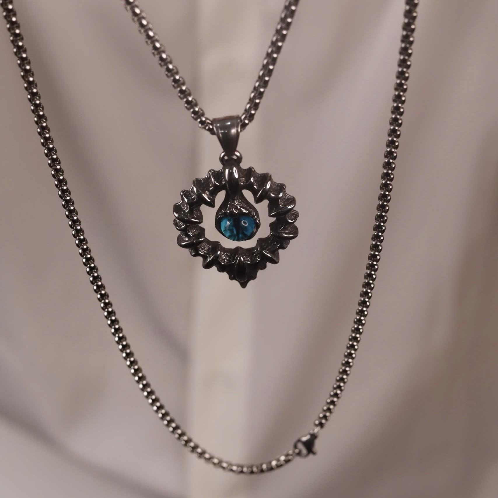 Vòng cổ titan mắt quỷ đá xanh