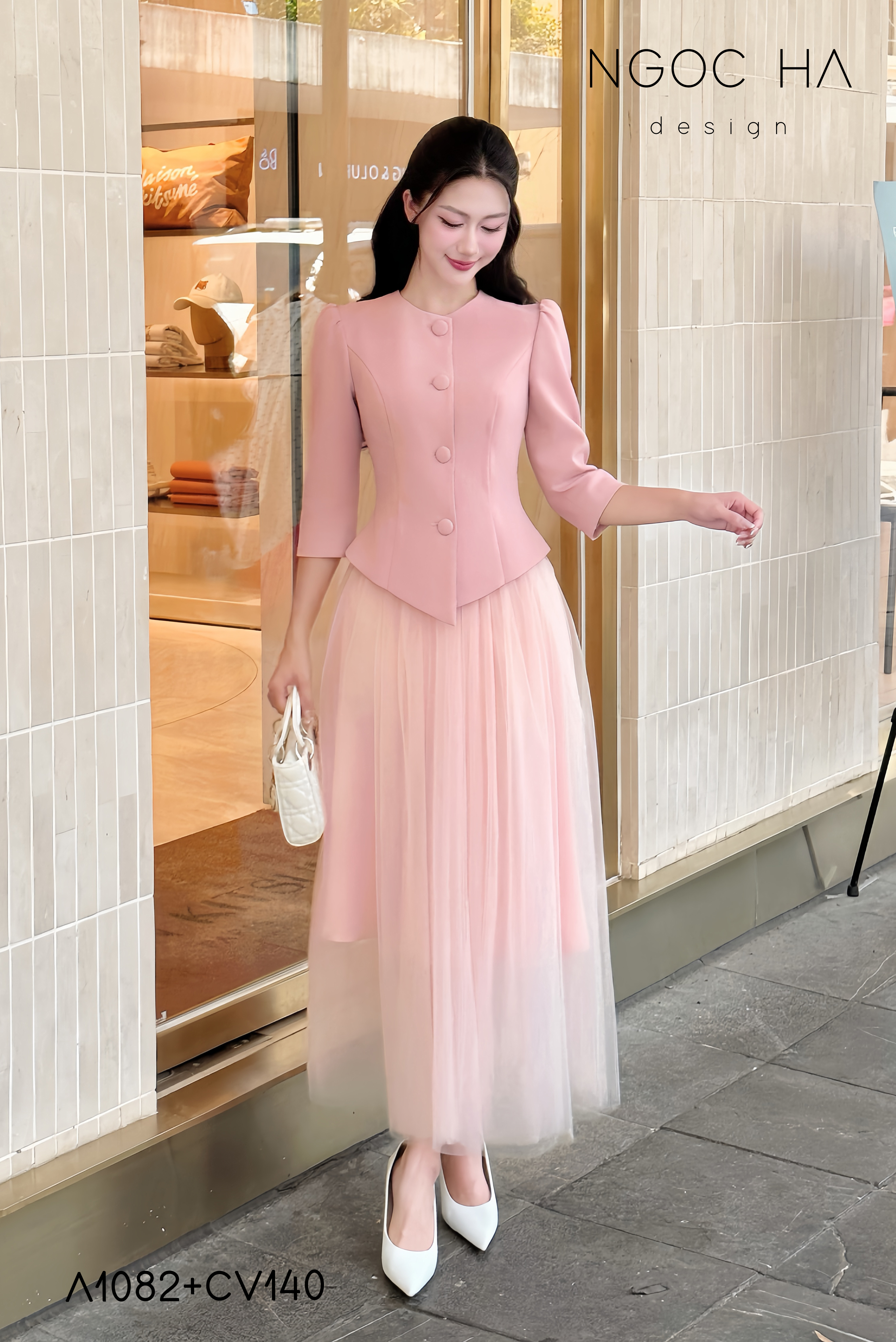 Lily_ Áo Vest Cổ Tròn Tay Lừng Mix Chân Váy Lưới Màu Hồng A1082+CV140