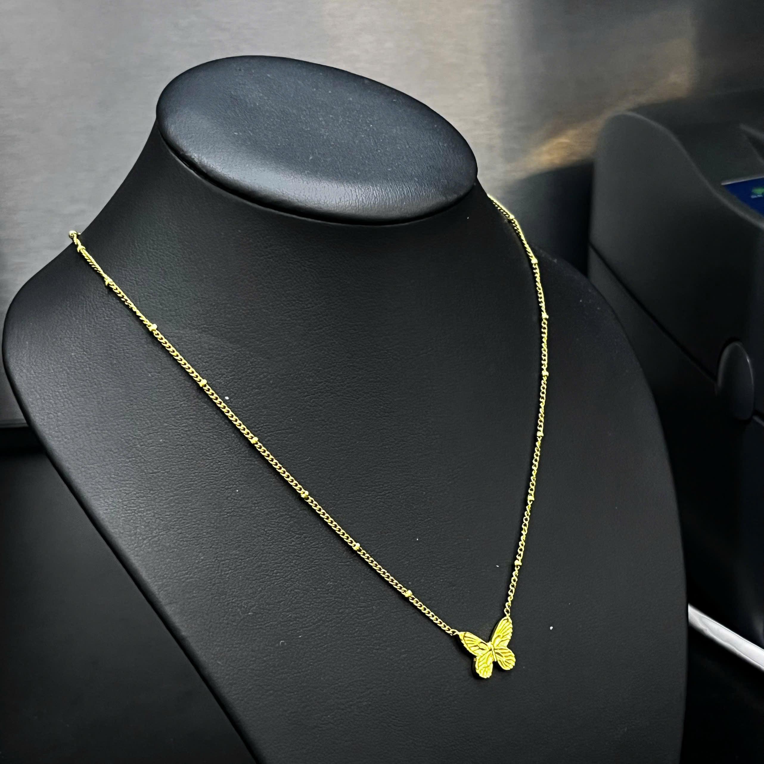 vòng cổ con bướm titan màu vàng._thumbnail_2