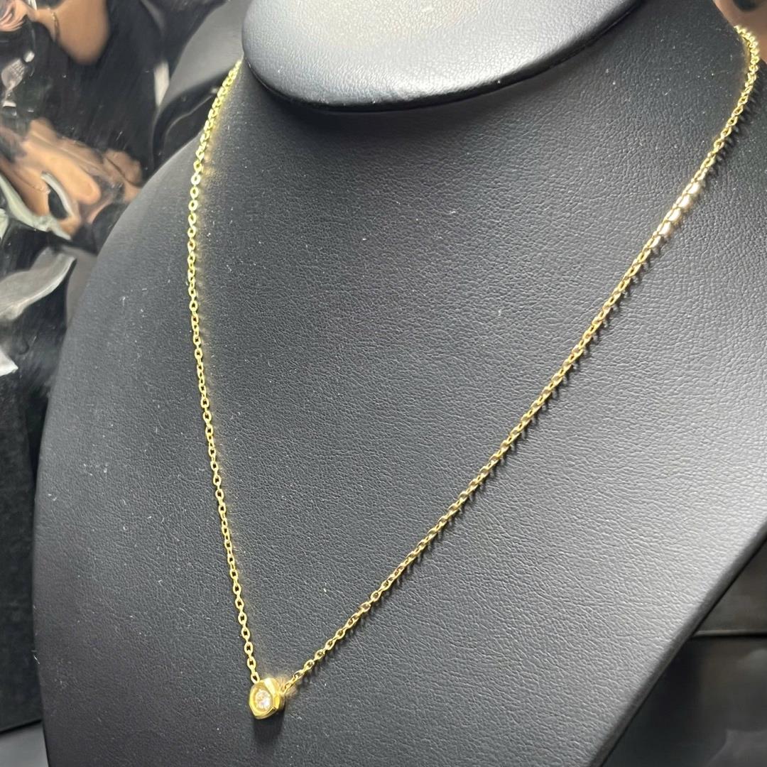 Vòng cổ titan vàng charm 1 kim cương._thumbnail_3