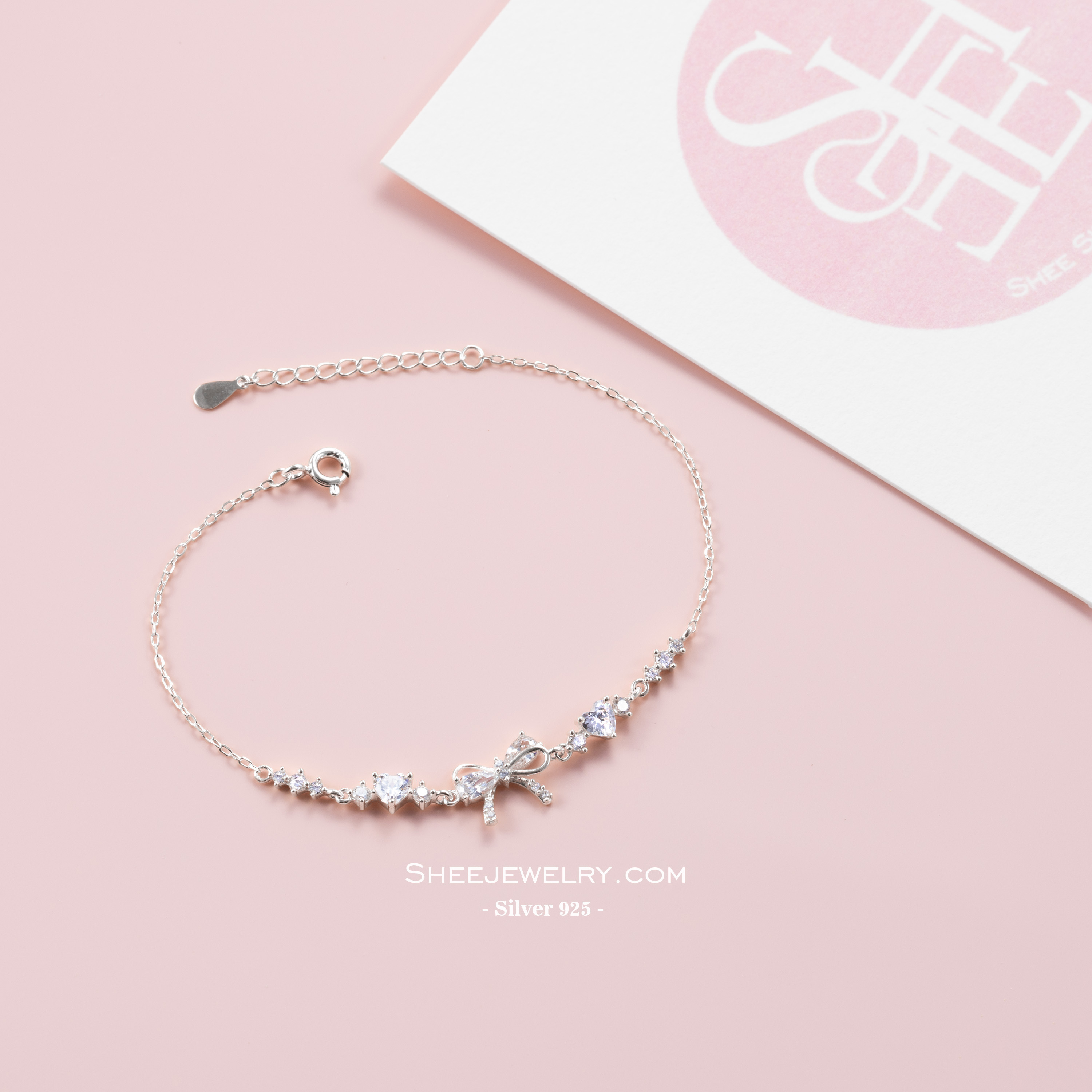  icon video play     Chia sẻ:  0 Vòng tay bạc nữ Shee Silver 925 đính đá hồng tim & nơ – phụ kiện xinh xắn, tôn da, quà tặng lãng mạn_thumbnail_2