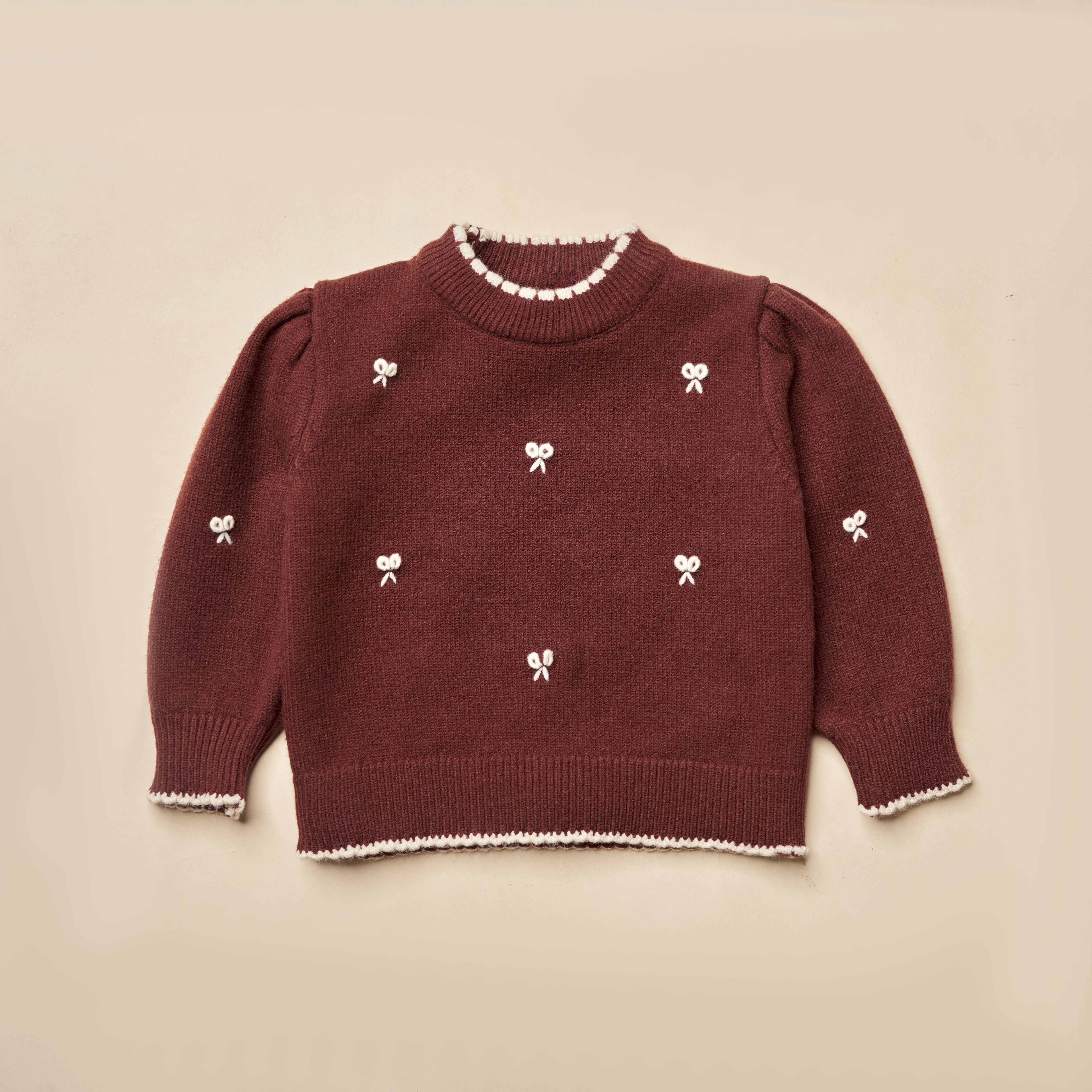 Áo len thêu  thân trước