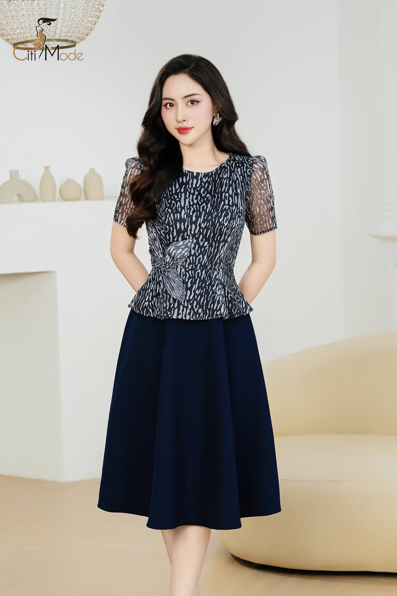 Đầm xoè hoạ tiết báo đen phối chân váy xanh_thumbnail_0