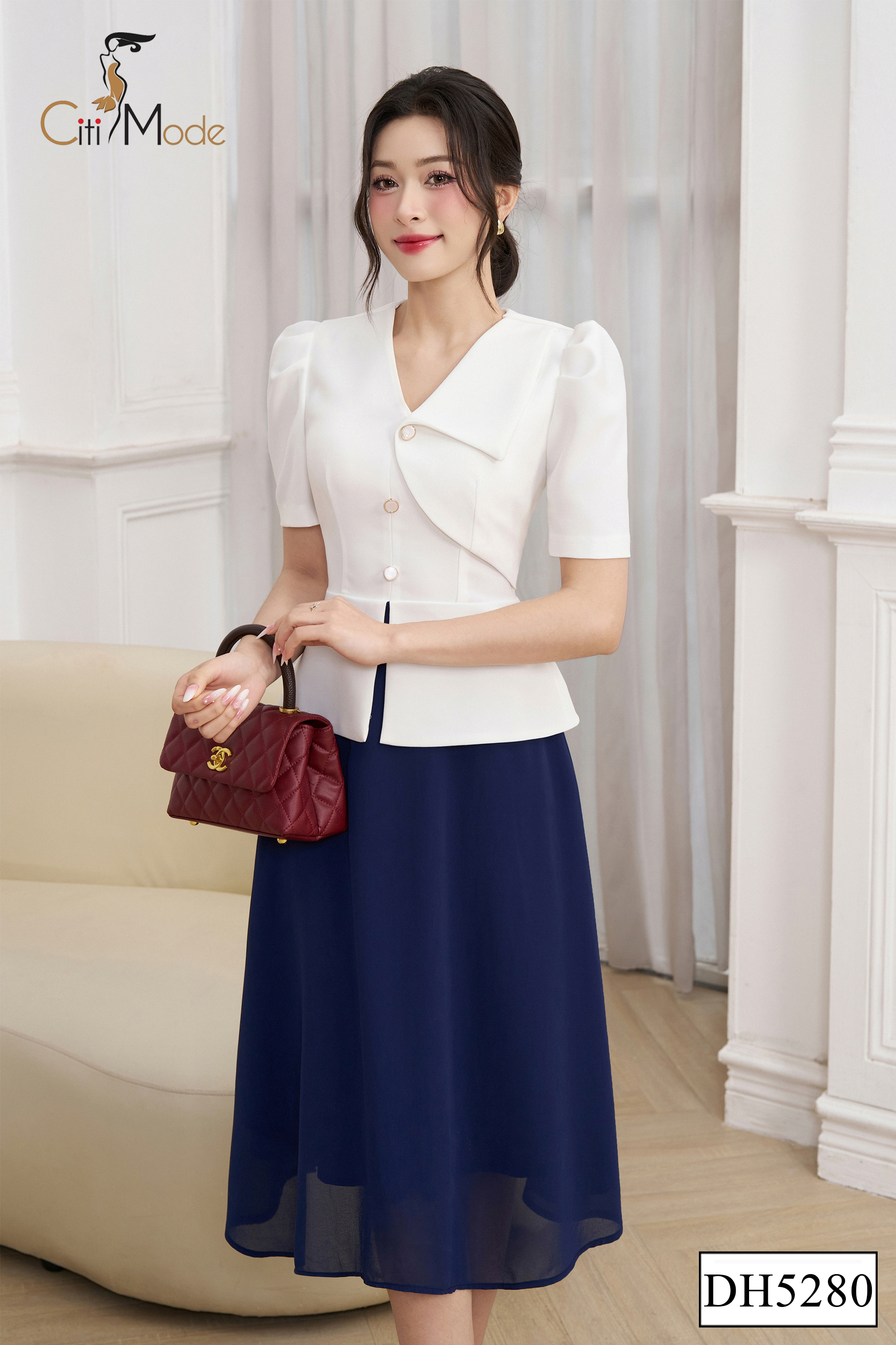 Đầm xoè trắng phối chân váy voan xanh