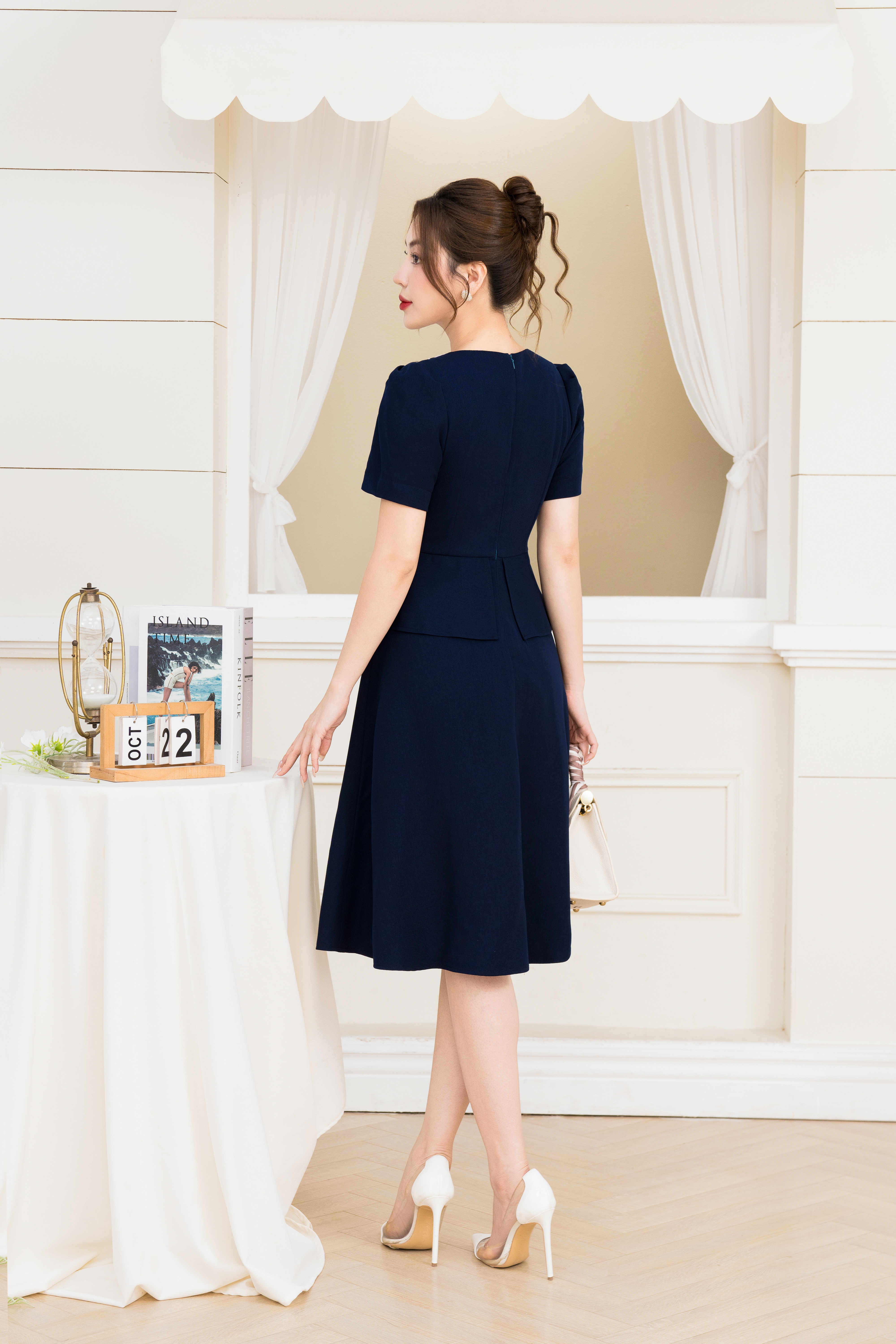 Đầm xoè peplum phối cổ nơ chấm bi