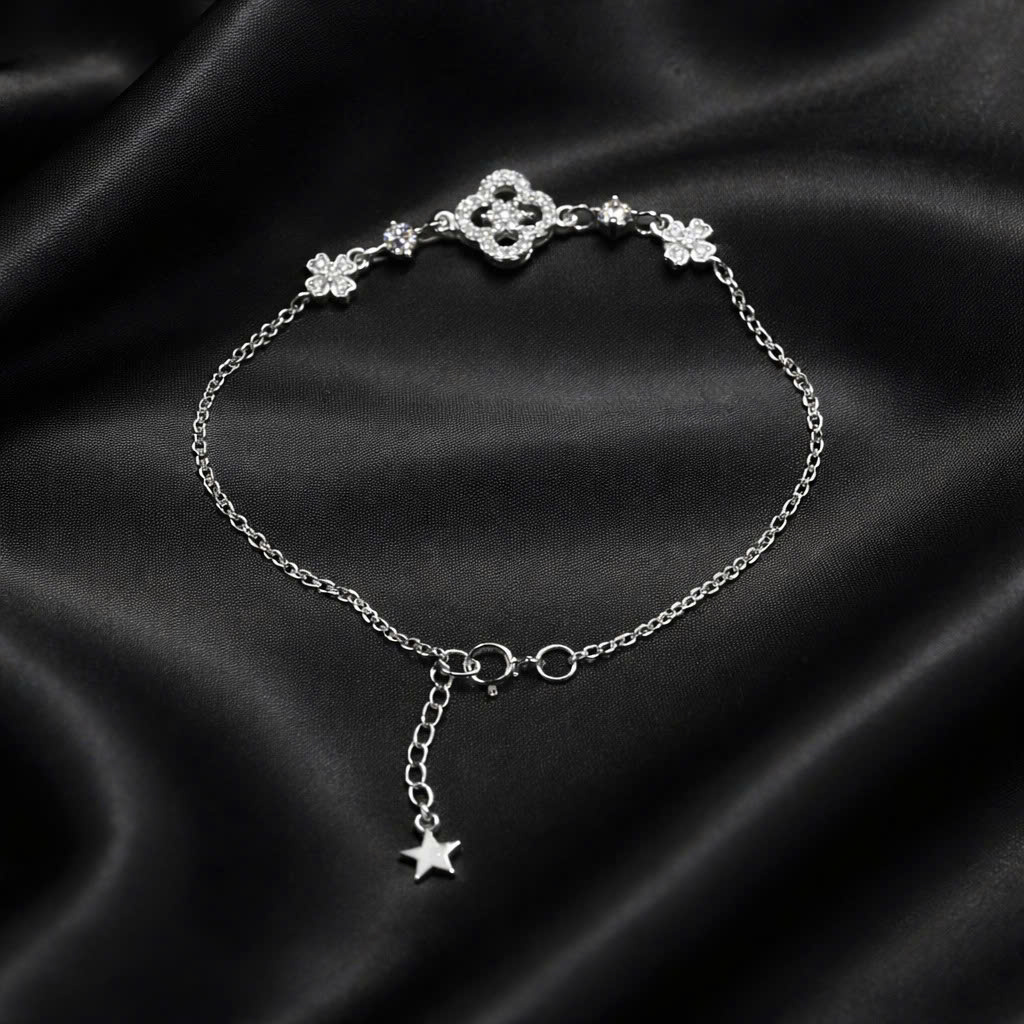 Vòng tay bạc xi kim Vancleef đen nhụy hoa trắng