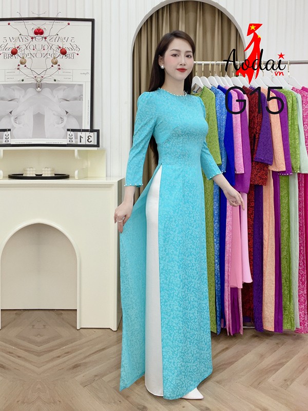 Áo dài Gấm G15 màu xanh ngọc cổ tròn tay bồng nhẹ