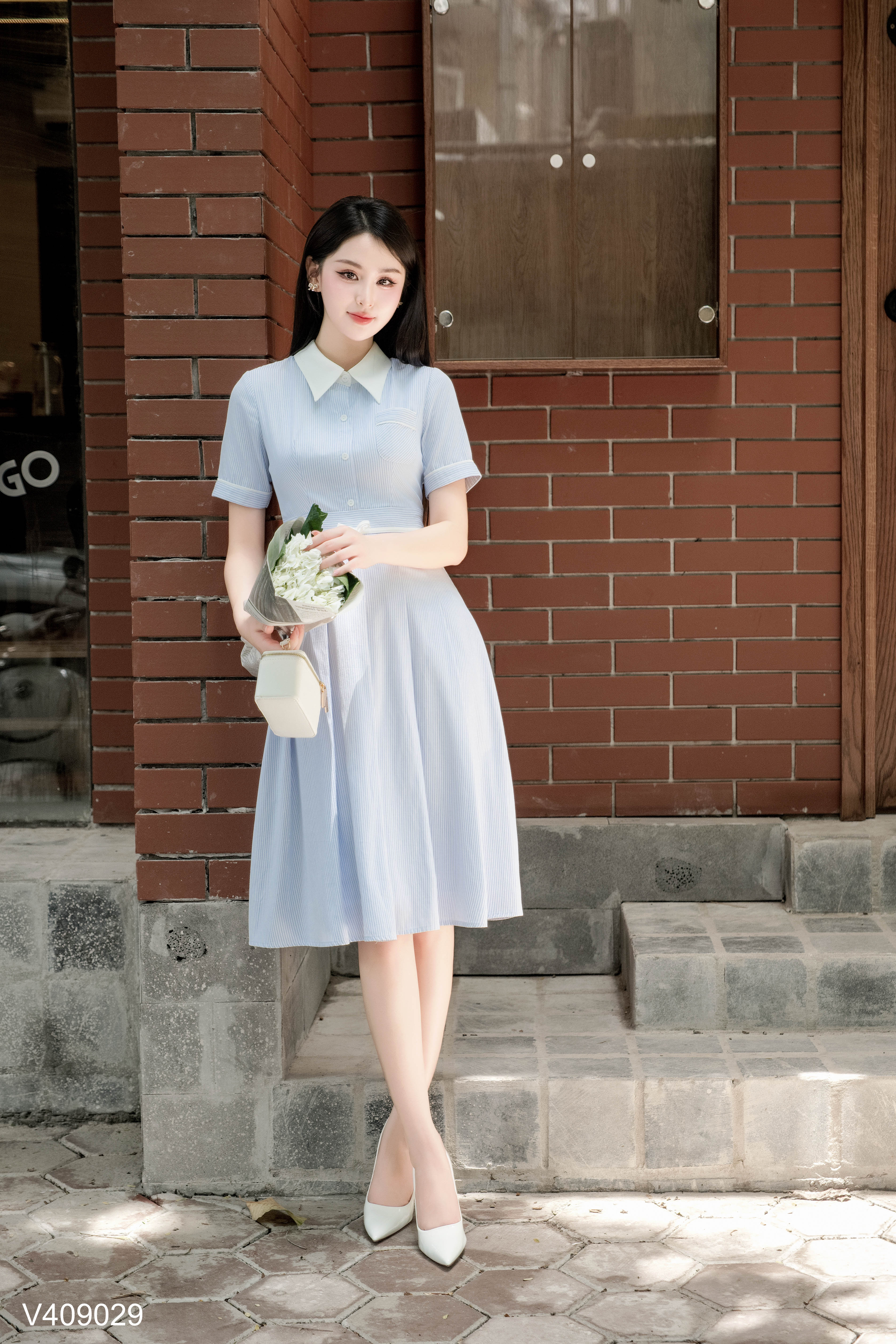 Váy kẻ xếp ly nơ eo