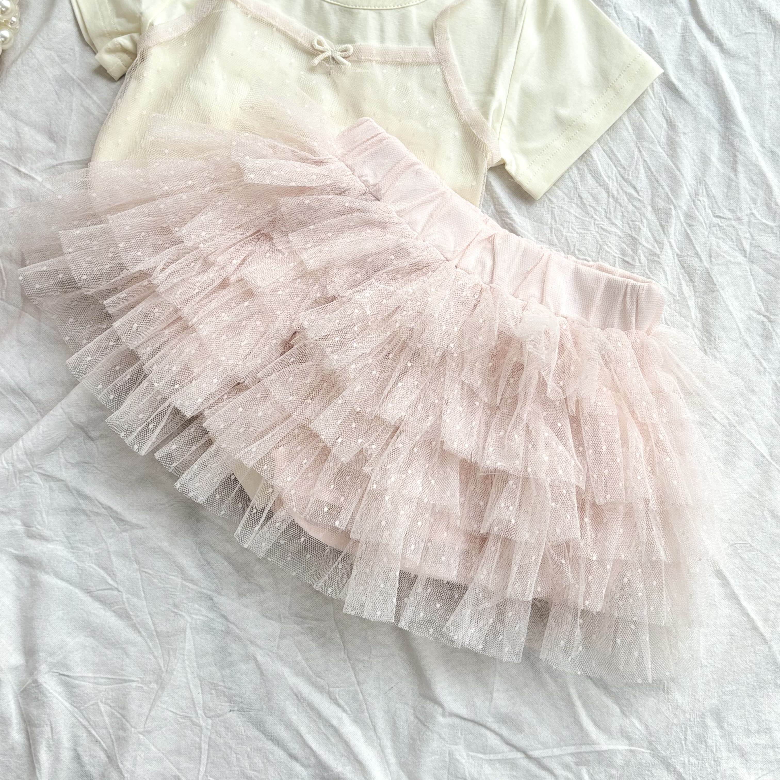 (A16) Áo thun mềm tay bo có họa tiết ren màu trắng kem QCCC mẫu hè 2025 cho bé gái_thumbnail_3