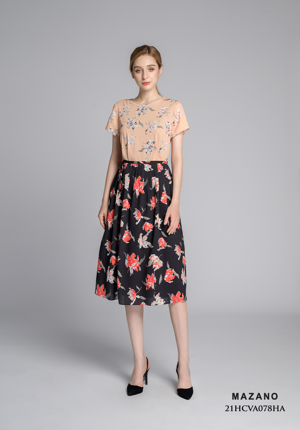 Váy họa tiết phối cách điệu chân xếp ly