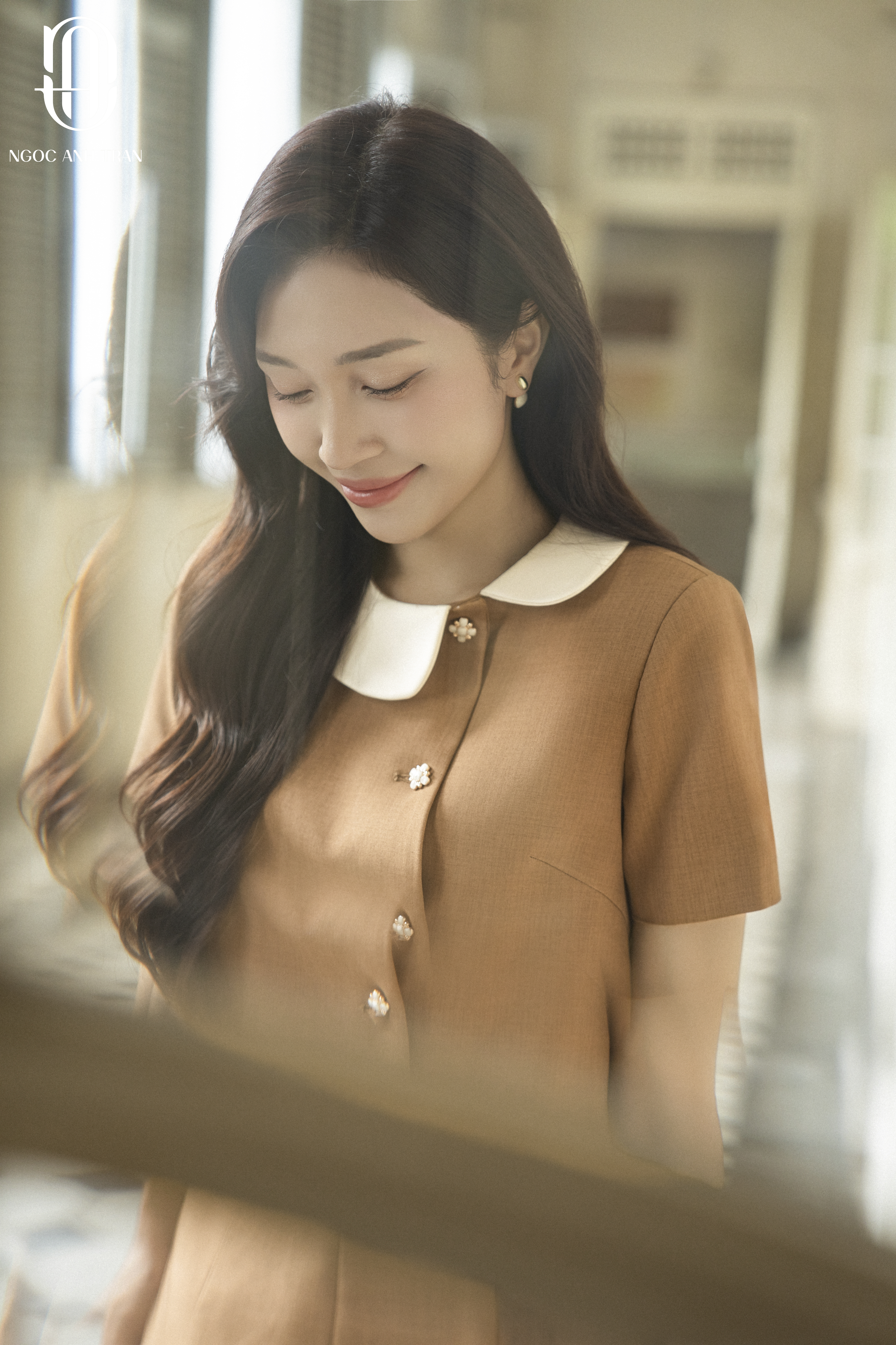 A209 - Set áo lửng nâu cổ lệch phối chân váy