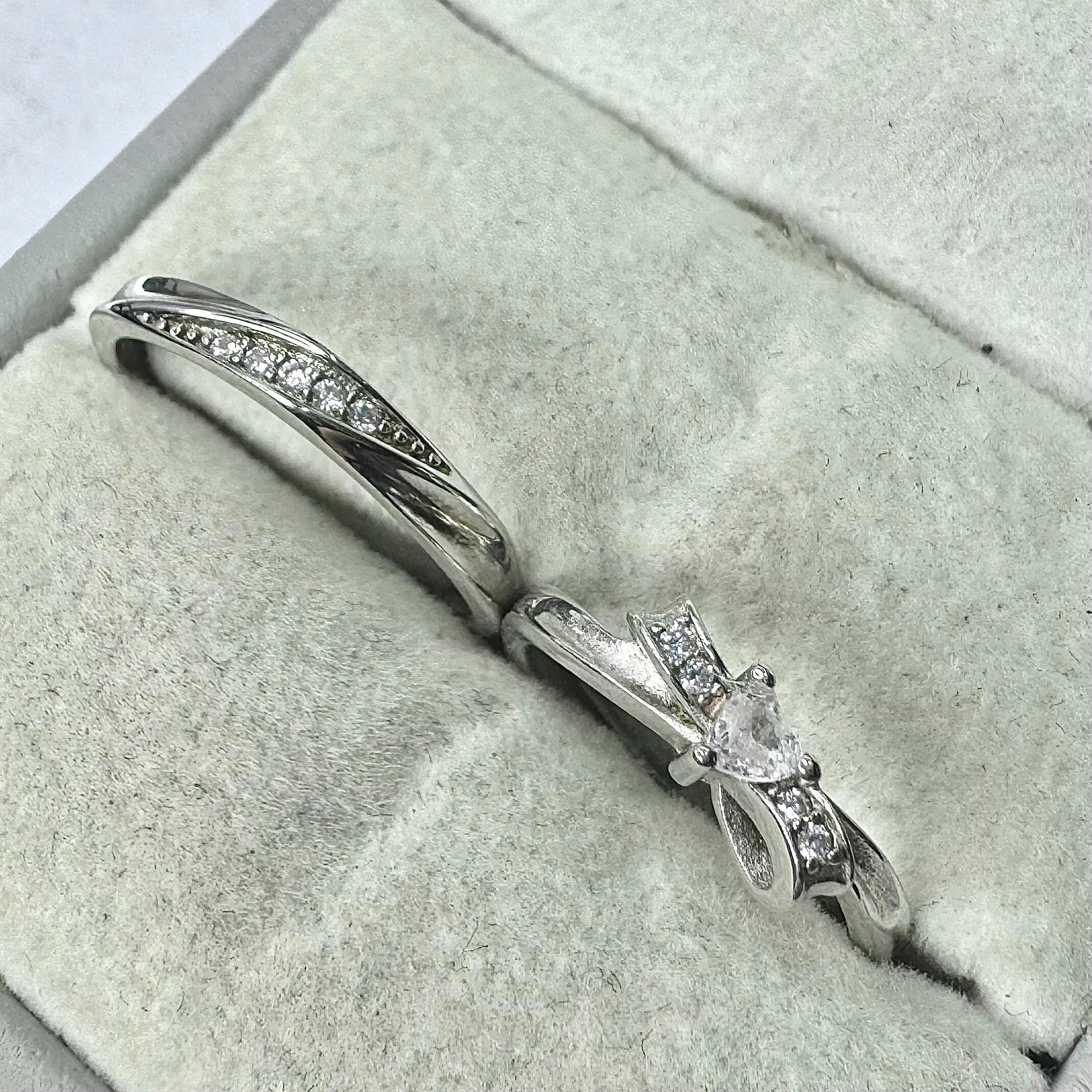 Nhẫn cặp bạc xi kim nơ và vòng đá_thumbnail_1