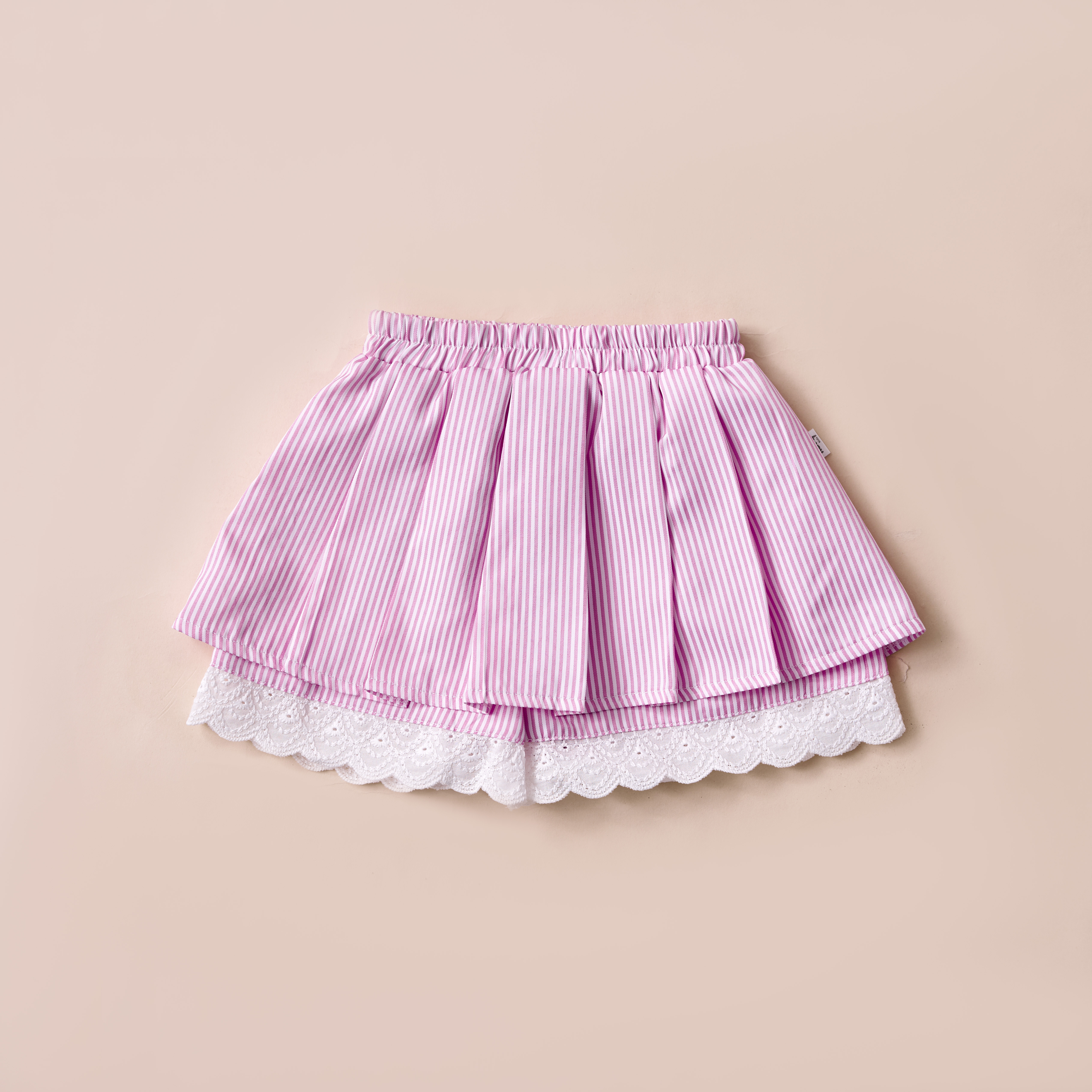 Chân váy xếp ly phối vải thêu