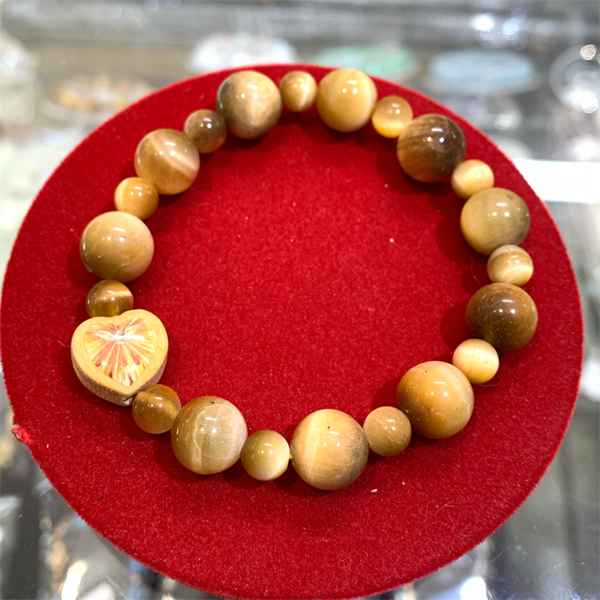 Vòng mân côi đá mắ hổ vàng tâm