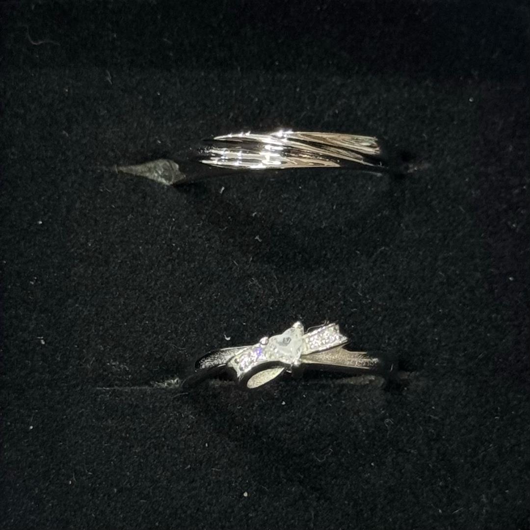 nhẫn cặp bạc si bạch kim nơ kim cương cách điệu và xoắn chéo freesize_thumbnail_1