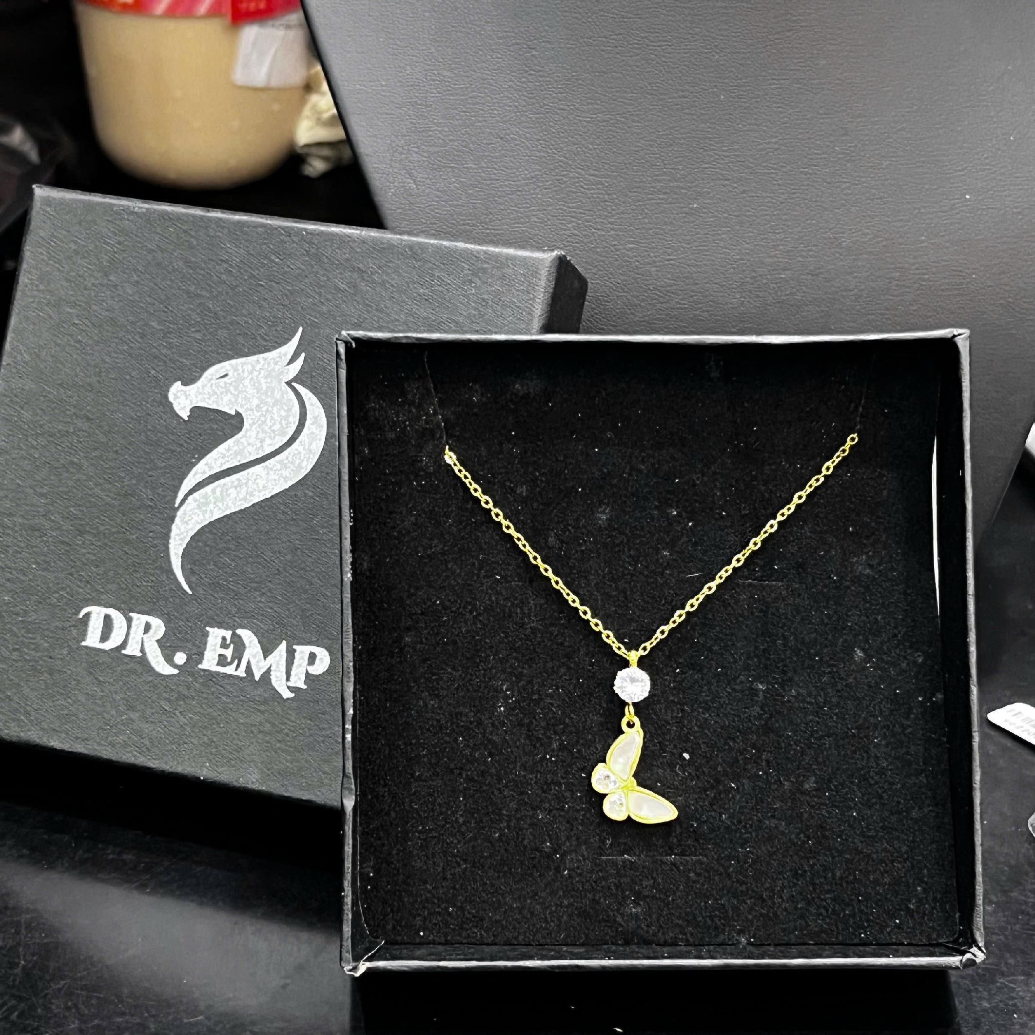 vòng cổ titan vàng charm kim cương rơi bướm trắng cánh kim cương_thumbnail_0