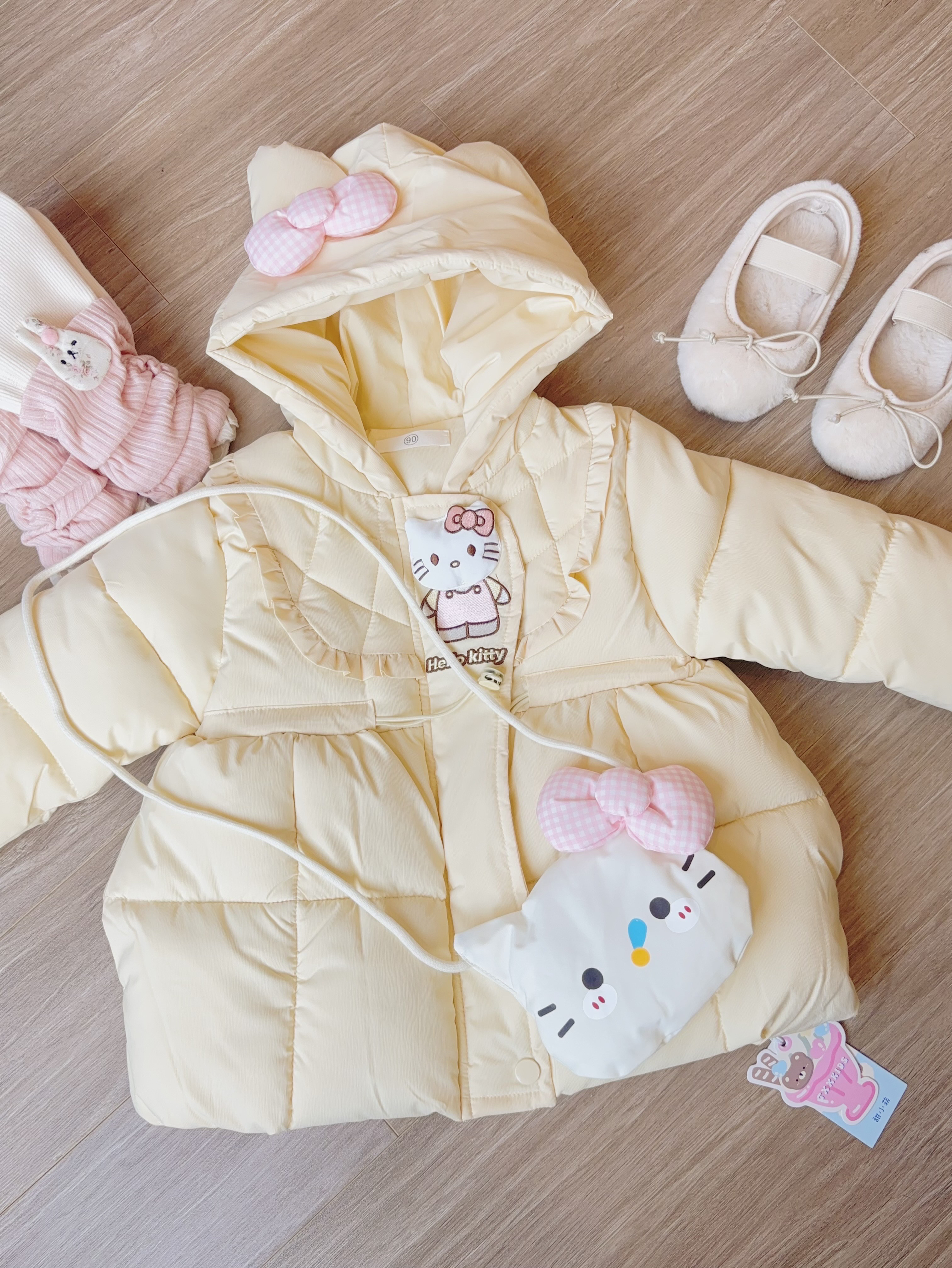 (M177) Áo phao vàng Kitty kèm dây đeo kitty