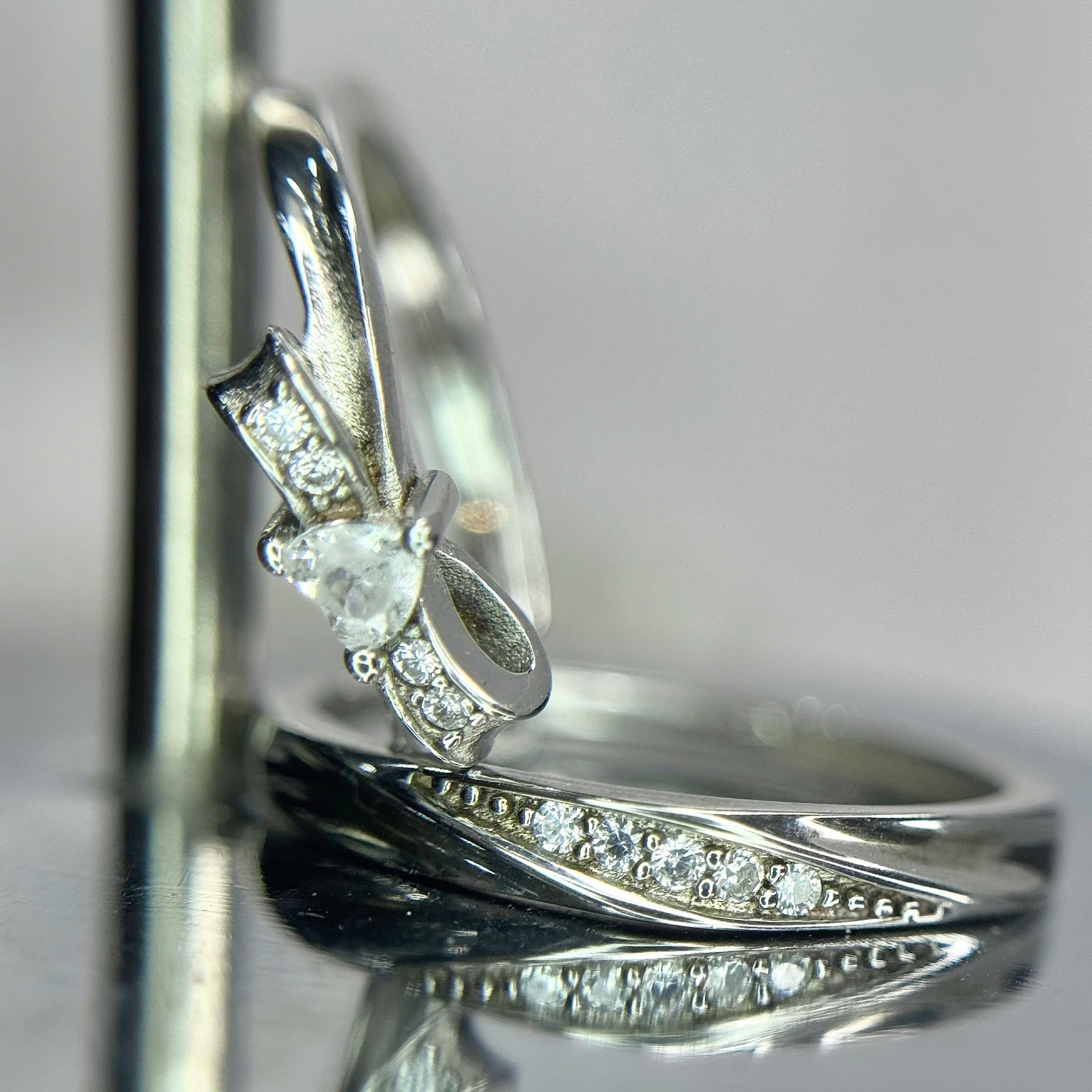 Nhẫn cặp bạc xi kim nơ và vòng đá_thumbnail_2