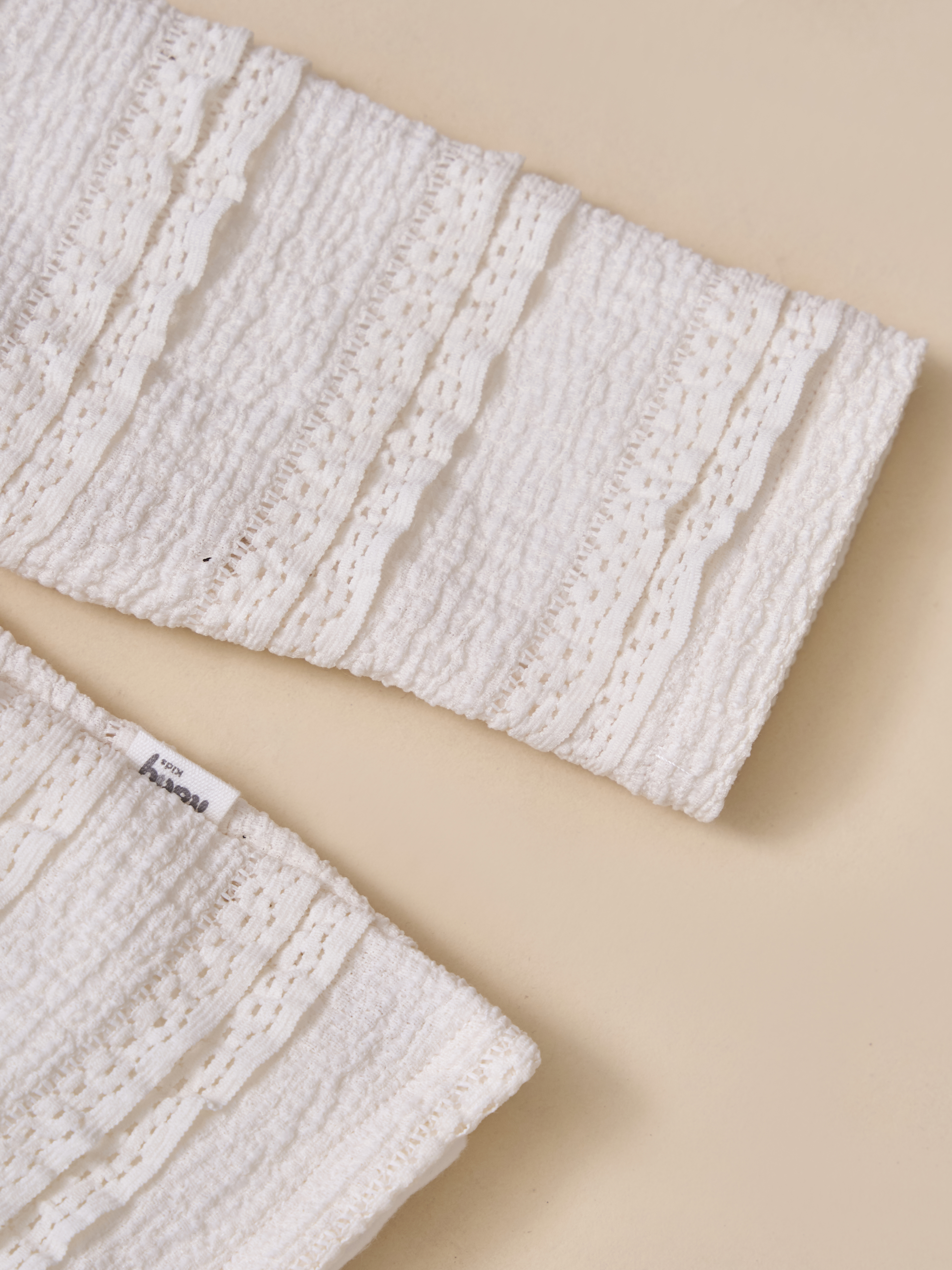 Áo thun dáng lửng vải ren bề mặt_thumbnail_2